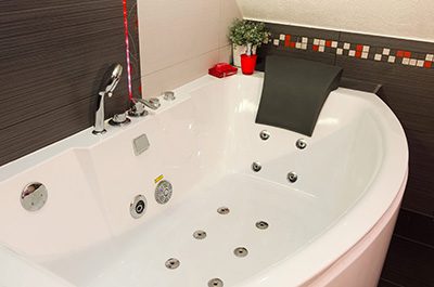 a bath tub with water jets