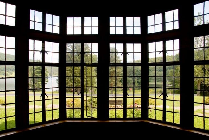 Bay window overlooking lake and trails in vacation home