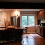 Upgraded kitchen with new windows by Twin Brook Construction